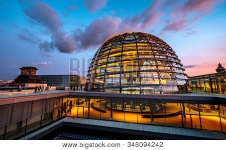 Reichstag large glass dome and roof terrace at sunset