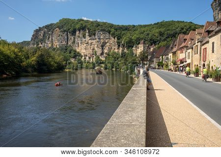 La Roque-gageac, Dordogne, France - September 7, 2018: Canoeing And Tourist Boat, In French Called G