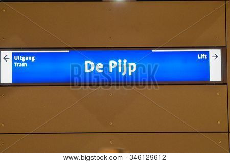 Amsterdam, Holland, August 2019. Metro Stop: The Large Writing At The Entrance Of The Escalator Tell
