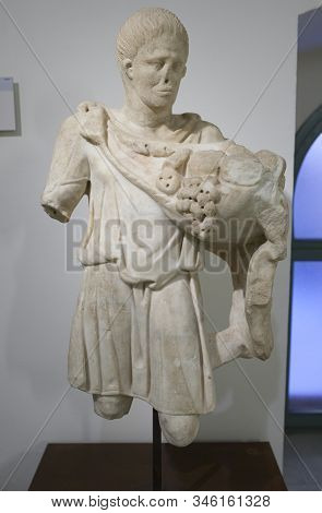 Badajoz, Spain - Jan 1st, 2018: Silvanus Sculpture, Roman Tutelary Deity Of Woods And Fields. Badajo