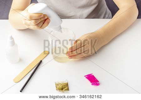 Step By Step Photo Instruction: How To Make Slime At Home. The Concept Of Diy.  Ingridients For Maki