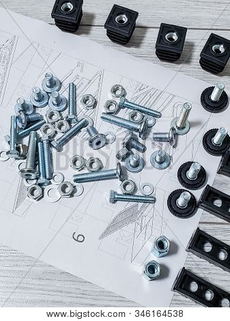 Many Details And Instructions For Assembling Furniture In Close-up. Assembling The Bed. Assembly Of 