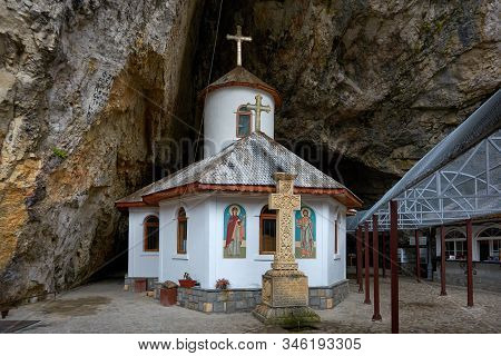 Ialomita Cave Monastery Is Located In Moreni Commune, In The Bucegi Mountains, Romania. The Monaster