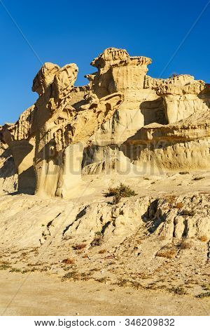 The Enchanted City Of Bolnuevo, Eroded Yellow Sandstone Formations, Murcia Spain. Tourist Attraction