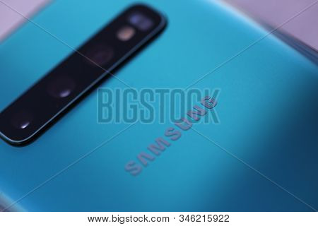Minsk, Belarus - March 8, 2019 : Smartphone Samsung Galaxy S 10 Aquamarine Color Illustrative Editor