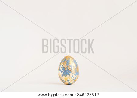 Easter Golden Decorated Egg With Golden Potal Isolated On White Background. Minimal Easter Concept. 