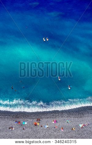 Tropical Beach With Colorful Beach Towls, People, Divers And Surfers - Top Down Aerial View