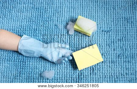 Female Hands Doing Spring Cleaning With Latex Gloves Sponges And Foam