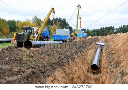 A Dug Trench In The Ground For The Installation And Installation Of Industrial Gas And Oil Pipes. Cr