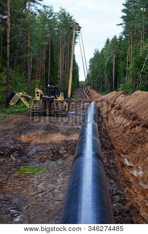 A Dug Trench In The Ground For The Installation And Installation Of Industrial Gas And Oil Pipes. T.