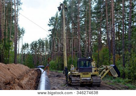 A Dug Trench In The Ground For The Installation And Installation Of Industrial Gas And Oil Pipes. T.