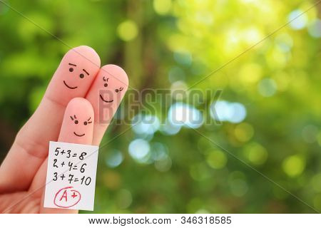 Fingers Art Of Happy Family. Concept Of Child Got Good Grade.