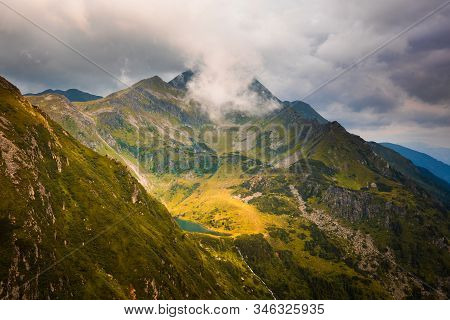 Unterer Kaltenbachsee Lake Lit In Sunlight In Solkpass, Austria