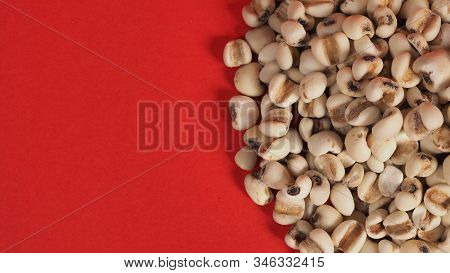 Job's Tears, Also Known As Adlay And Coix On Red Background. Popular In Asian Cultures As A Food Sou