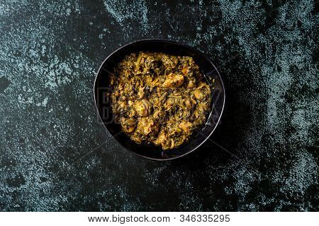 Indian Dish Spinach Lamb Palak With Chappati Flat Bread.