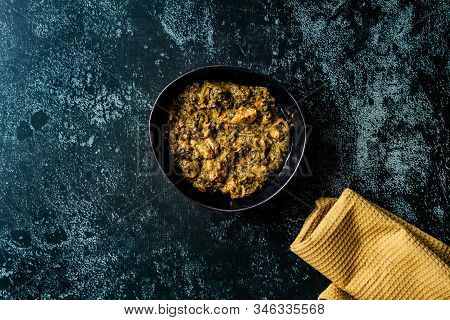 Indian Dish Spinach Lamb Palak With Chappati Flat Bread. Traditional Dish.