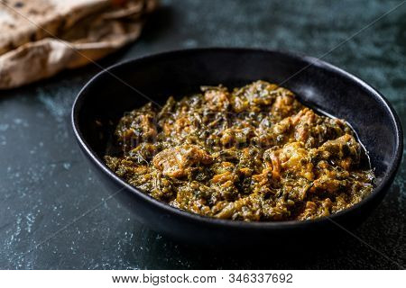 Indian Dish Spinach Lamb Palak With Chappati Flat Bread. Traditional Dish.