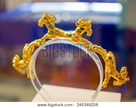 Azov, Russia - July 27, 2019: Golden Bracelet With Horse Figures, The Exhibition 