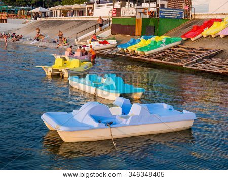 Kabardinka, Russia- July 29, 2019: Catamaran Rental On The Beach, Kabardinka Village, Krasnodar Terr