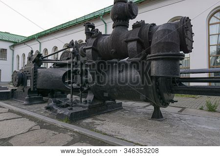 Yekaterinburg, Russia - June 20, 2019: Monument Mechanism Reversible Steam Engine Near The Museum Of