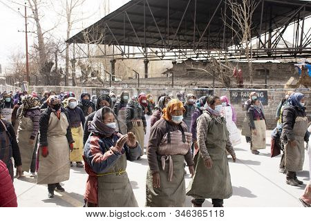 Jammu Kashmir, India - March 20 : Tibetans Walking Parade On The Road For Respect Praying Buddha Cha