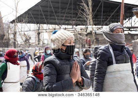 Jammu Kashmir, India - March 20 : Tibetans Walking Parade On The Road For Respect Praying Buddha Cha