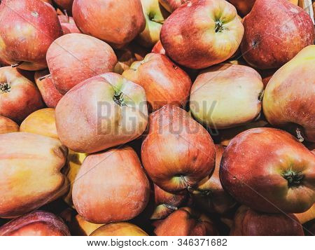 Delicious Red Juicy Apples Stacked In The Market For Sale As A Healthy Fruit Part Of A Healthy Lifes