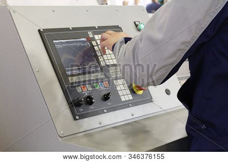 Moscow, Rf, 04.17.2019: Hand Of A Working Man On The Control Panel Of The Machine In The Factory. In