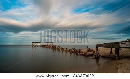 Dilapidated Old Fishing Dock Collapsing Into The Sea In Pak Nam Pran On The Gulf Of Thailand In Thai