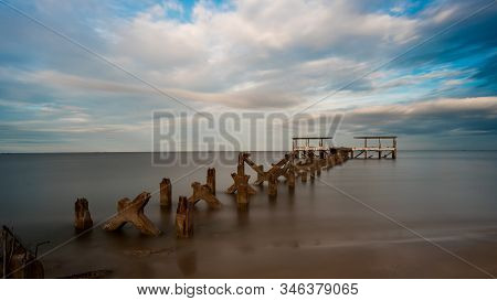 Dilapidated Old Fishing Dock Collapsing Into The Sea In Pak Nam Pran On The Gulf Of Thailand In Thai