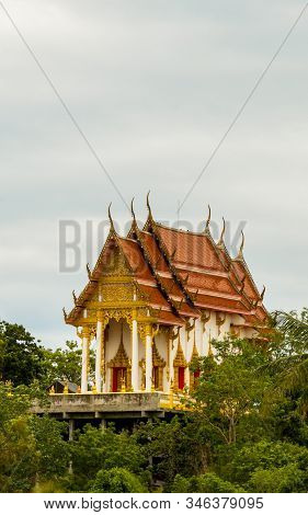 Thai Temple Rising About The Trees In Pak Nam Pran, Pranburi Thailand