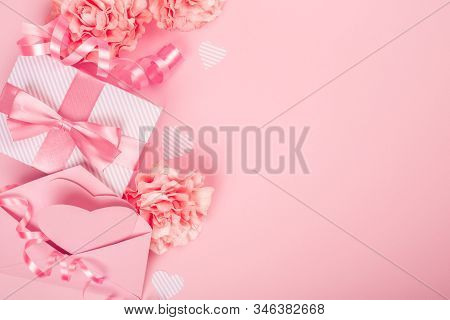 Valentines Day Gift In Box Envelope With Heart Shaped Cardand Rose Floers On Pink Background With Co