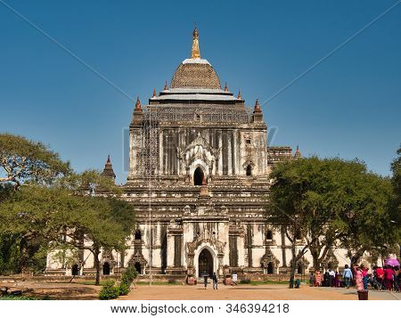 Bagan, Myanmar - February 03, 2019:  Tourists And Local People Visiting The Ancient Shwegugyi Pagoda