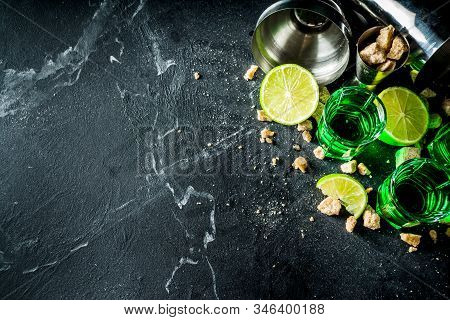Three Shot Glasses With Absinthe