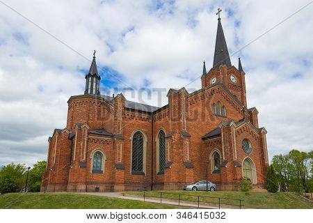 Old Neo-gothic Lutheran Church Closeup On A Cloudy June Day. Loviisa, Finland