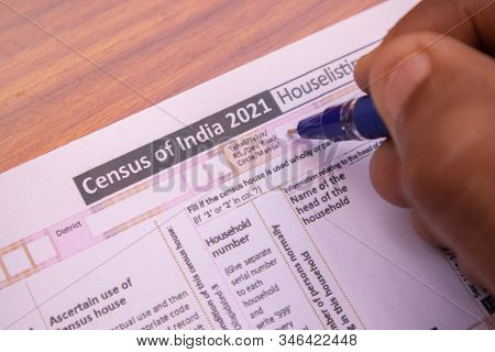 Maski, India 18, January 2020 - Close Up Of Hands Filling Up The Census Of India 2021 Form Or Npr At