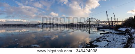 Beautiful Panoramic View Of Fraser River And Pattullo Bridge In The City During A Cold And Icy Winte