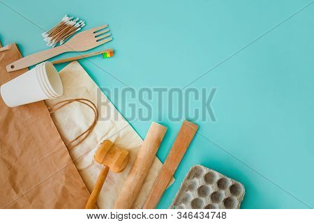 Set Of Eco Friendly Accessories. Flat Lay Eco Friendly Natural Bamboo Toothbrushes, Wooden Utensils,
