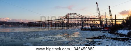Beautiful Panoramic View Of Fraser River And Pattullo Bridge In The City During A Cold And Icy Winte