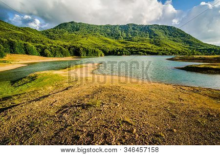 Water Reservoir With Green Hill In Background In Albania, Near Fushe Stude