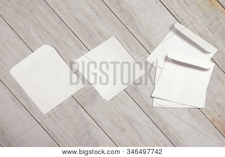 Brochure Mock-up On Background. Opened Tri Fold Blank Paper Brochure Mock Up. Cover For Your Design.