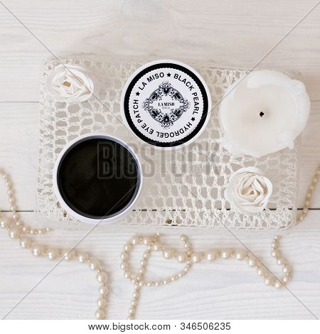 Seoul, South Korea. January 2020. Hydrogel Patches Under The Eyes With Black Pearls Surrounded By Pe