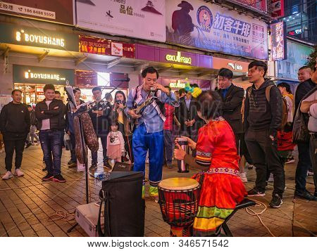 Changsha/china-17 October 2018:unacquainted Street Performers Singing And Wearing Traditional Tribe 
