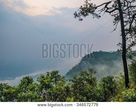 Beautiful Sunrise With  Sea Of Mist In The Early Morning On Phu Kradueng Mountain National Park In L