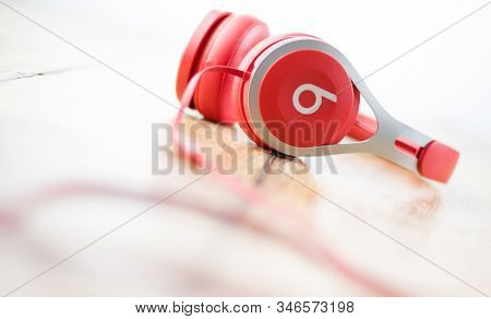 Alloa, Scotland - July 17 2019: Red Headphones, Beats By Dr. Dre