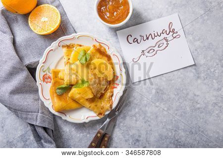 Crepe Suzette. Traditional French Crepe Suzette With Orange Sauce . Top View, Flat Lay. Mardi Gras F