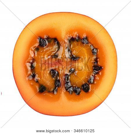 Fresh Tamarillo Fruit Slices With Leaves Isolated On White Background. Top View. Flat Lay. Set Or Co