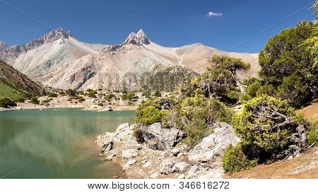 Lake Kulikalon Placing Between Fan Mountains, Tajikistan. Beautiful View Of Lake Among Mountains, St