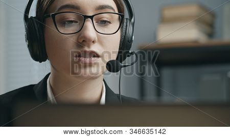 Closeup Of Woman Working In Callcenter Consulting Client Online, Employee Working In Customer Servic