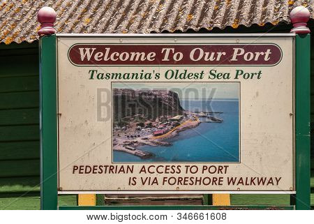 Stanley, Tasmania, Australia - December 15, 2009: Welcome Sign At The Port With Aerial Photo Of The 